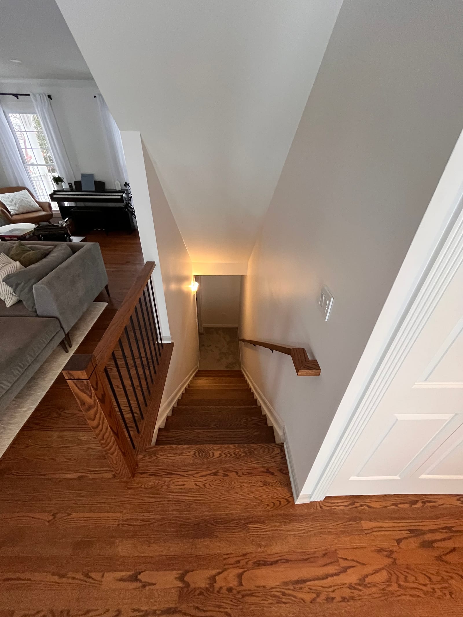 Oak rail, iron balusters